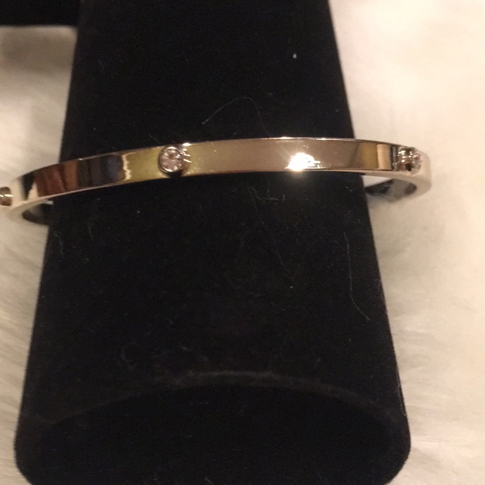 Silver tone bangle w crystals